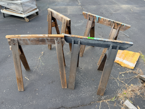 (4) WOODEN SAW HORSES.