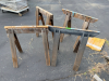 (4) WOODEN SAW HORSES.