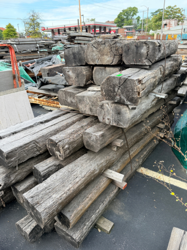 (3) STACKS / BUNDLES OF RECLAIMED LUMBER AND LARGE BEAMS.
