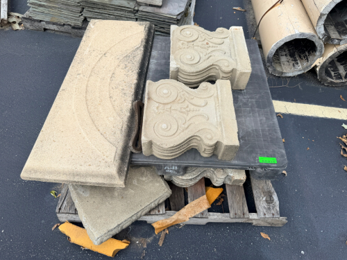 LOT OF ORNAMENTAL CAST STONE ARCHITECTURAL COMPONENTS INCLUDING DECORATIVE SCROLL BRACKETS/CORBELS, MOLDED TRIM, CAPS, AND ASSORTED STONE SECTIONS.