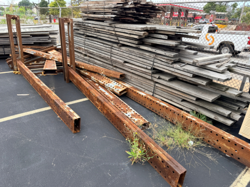 (2) LARGE METAL MATERIAL TREE RACKING UPRIGHTS. NO ARMS.