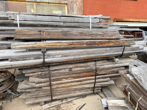 (3) STACKS / BUNDLES OF RECLAIMED LUMBER AND LARGE BEAMS.