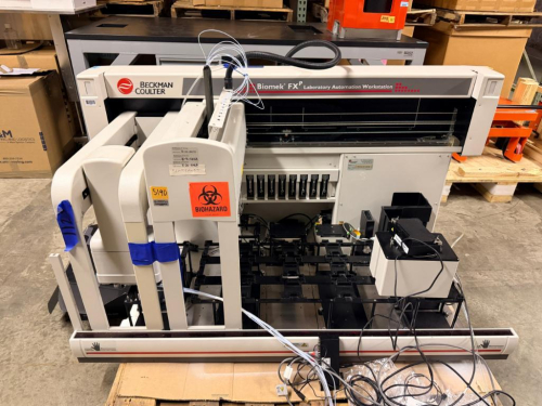 BECKMAN COULTER BIOMEK FXP LABORATORY AUTOMATION WORKSTATION WITH DUAL AUTOMATED LIQUID-HANDLING ARMS, MULTI-POSITION DECK, PIPETTING COMPONENTS, LABWARE HOLDERS, TUBING, CABLING AND ASSOCIATED COMPONENTS AS SHOWN.