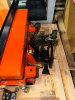 HYDRAULIC SCISSOR LIFT TABLE WITH FOOT-PUMP OPERATED LIFT MECHANISM, MANUAL RELEASE CONTROL, STEEL PLATFORM, CASTERS AND PUSH/PULL HANDLE. - 6