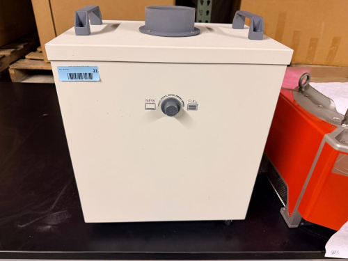 GLOWFORGE AIR-FILTERING APPLIANCE WITH ENCLOSED FILTER HOUSING, REMOVABLE TOP COVER, DUAL CARRY HANDLES, EXHAUST CONNECTION AND FRONT FILTER-LIFE INDICATOR CONTROL.