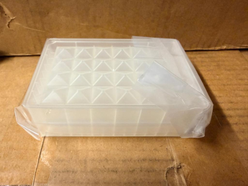 (4) CASES OF AGILENT TECHNOLOGIES 24-POSITION STORAGE PLATES FOR 10 ML SQUARE VIALS, SUPPLIED IN ORIGINAL FACTORY BOXES. EACH STORAGE PLATE FEATURES A 24-POSITION DIVIDED GRID FOR INDIVIDUAL VIAL ORGANIZATION.