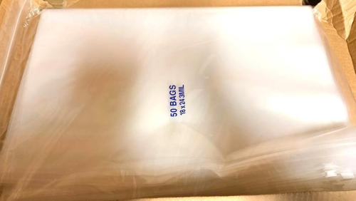 (8) BOXES ULINE CLEAR POLY SLIDER ZIP BAGS, 18" X 24", 3 MIL THICKNESS. TWO CARTONS SHOWN WITH 100 BAGS PER CARTON