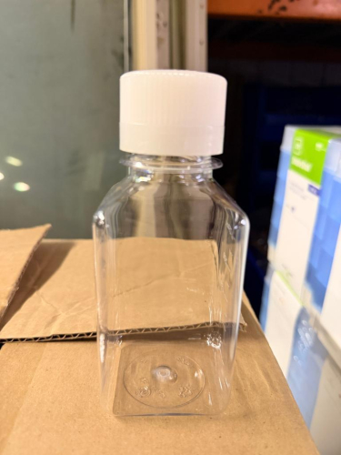 (1) BOX OF CLEAR PET MEDIA BOTTLES WITH WHITE SCREW CLOSURES, 250 ML CAPACITY. CASE QUANTITY OF 60 BOTTLES.