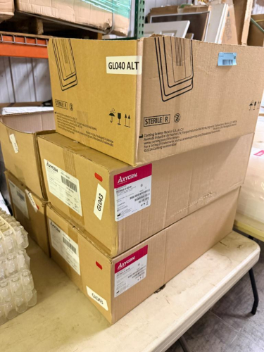 (5 )CASES OF AXYGEN 50 ML DISPOSABLE REAGENT RESERVOIRS, INDIVIDUALLY WRAPPED AND STERILE. POLYSTYRENE CONSTRUCTION.