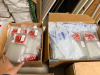 (2) PACKS OF VIALS WITH RED SCREW CAPS PACKAGED IN CLEAR PLASTIC TRAYS. LARGE LOT CONSISTING OF MULTIPLE TRAYS DISTRIBUTED BETWEEN TWO BOXES. - 2