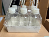(6) 2-LITER CLEAR LABORATORY MEDIA BOTTLES WITH WHITE SCREW CAPS AND MOLDED GRADUATION MARKINGS.