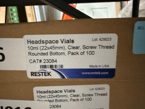 (24) BOXES OF RESTEK CLEAR GLASS HEADSPACE VIALS WITH SCREW-THREAD NECK AND ROUNDED BOTTOM, PACKAGED 100 VIALS PER BOX.