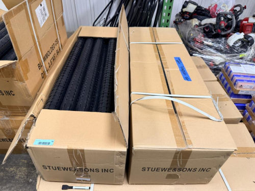 (2) BOXES OF BLACK PLASTIC MULTI-POSITION LABORATORY TUBE/VIAL RACKS WITH MOLDED NUMBERED POSITIONS AND INTEGRATED HANDLES. TWO LARGE CARTONS INCLUDED AS SHOWN.
