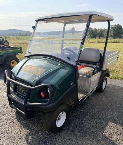 CLUB CAR CARRYALL 300 GAS UTILITY VEHICLE WITH ALUMINUM CARGO BED, FOLD-DOWN TAILGATE, TWO-PERSON BENCH SEAT, WINDSHIELD, CANOPY TOP, HEADLIGHTS, FRONT BRUSH GUARD AND REAR RECEIVER HITCH. EFI GAS ENGINE.