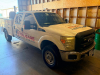 2012 FORD F-350 SUPER DUTY CREW CAB SERVICE TRUCK WITH READING UTILITY BODY, MULTIPLE LOCKING STORAGE COMPARTMENTS, CHAMPION R-SERIES GAS ENGINE DRIVEN AIR COMPRESSOR WITH KOHLER ENGINE, HOSE REELS, FLUID TRANSFER EQUIPMENT, REAR MOUNTED BENCH VISE, REAR - 26