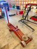 HEAVY DUTY LONG FRAME HYDRAULIC FLOOR JACK WITH MANUAL PUMP HANDLE, STEEL LIFTING SADDLE, DUAL FRONT STEEL WHEELS, AND REAR SWIVEL CASTERS. - 3