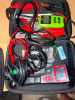 AUTOMOTIVE DIAGNOSTIC AND BATTERY TESTING TOOL PACKAGE INCLUDING TOPDON HANDHELD DIGITAL TESTER AND JD DIAG BT-200 BATTERY TESTER WITH LCD DISPLAYS, CONTROL BUTTONS, DIAGNOSTIC CABLES, BATTERY CLAMPS, CONNECTORS, AND ZIPPERED CARRYING CASE.
