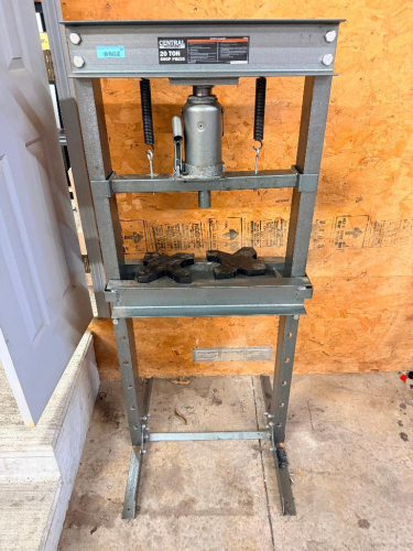 CENTRAL MACHINERY 20 TON HYDRAULIC SHOP PRESS WITH HEAVY-DUTY STEEL H-FRAME CONSTRUCTION, MANUAL HYDRAULIC BOTTLE JACK, ADJUSTABLE HEIGHT PRESS BED, DUAL RETURN SPRINGS, AND (2) REMOVABLE STEEL ARBOR PLATES.