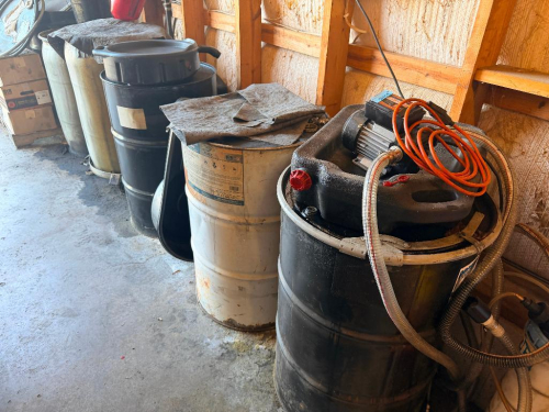 SEVERAL BARRELS OF USED MOTOR OIL