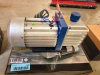 ELECTRIC ROTARY VANE VACUUM PUMP WITH ALUMINUM HOUSING, CARRY HANDLE, OIL FILL CAP AND ELECTRIC MOTOR.