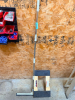 LONG HANDLE FLOOR SQUEEGEE WITH METAL HANDLE AND RUBBER BLADE, INCLUDES WOODEN FURNITURE DOLLY WITH CARPETED SUPPORTS AND FOUR CASTERS.
