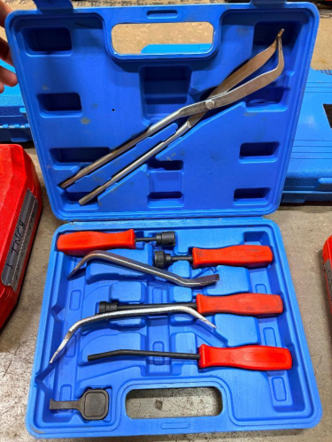 AUTOMOTIVE TRIM, UPHOLSTERY AND PANEL REMOVAL TOOL SET WITH ASSORTED PRY BARS, CLIP REMOVERS, HOOK TOOLS AND LONG-REACH PLIERS IN MOLDED PLASTIC CARRYING CASE.