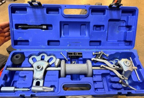 HEAVY-DUTY JAW PULLER AND SLIDE HAMMER COMBINATION SET WITH TWO-JAW AND THREE-JAW PULLER ASSEMBLIES, SLIDE HAMMER, PULLER ARMS, THREADED RODS, ADAPTERS AND MOLDED PLASTIC CARRYING CASE.