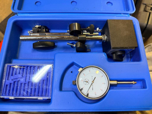 MAGNETIC BASE DIAL INDICATOR SET WITH 0-1" DIAL INDICATOR, ADJUSTABLE SUPPORT ARMS, MAGNETIC BASE, ASSORTED CONTACT POINTS AND PLASTIC CARRYING CASE.
