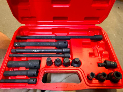 18-PIECE IMPACT SOCKET EXTENSION AND ADAPTER SET WITH ASSORTED EXTENSION BARS, UNIVERSAL JOINTS, SOCKET ADAPTERS, IMPACT COUPLERS, AND MOLDED PLASTIC CARRYING CASE.