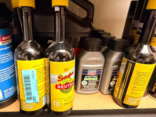 (1)LOT ASSORTED AUTOMOTIVE FLUIDS AND ADDITIVES INCLUDING STA-BILIZER FUEL ADDITIVES, LIQUI MOLY BRAKE FLUID, DOT 4 BRAKE FLUID, AND OTHER AUTOMOTIVE CHEMICAL PRODUCTS. SOLD AS ONE LOT.