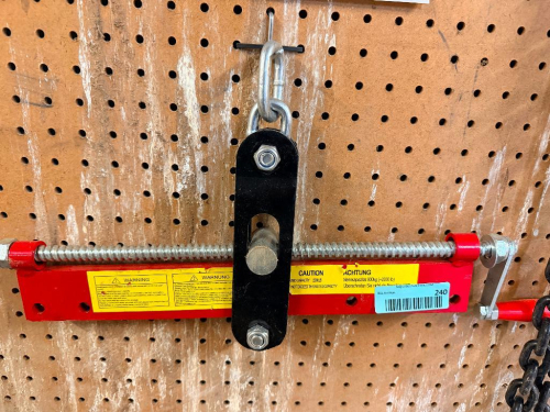 HEAVY-DUTY ENGINE SUPPORT BAR WITH THREADED ADJUSTMENT ROD, HAND CRANK, STEEL SUPPORT BRACKET, CHAIN, AND HOOK ASSEMBLY.