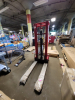 (1) MANUAL FORK-OVER STACKER - 2