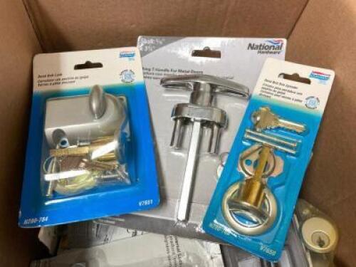 BOX OF ASSORTED DOOR LOCKS, DEAD BOLTS, AND HARDWARE.