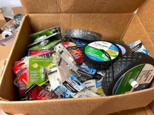 BOX OF ASSORTED LAWN MOWER PARTS, SPARK PLUGS, AND PARTS.
