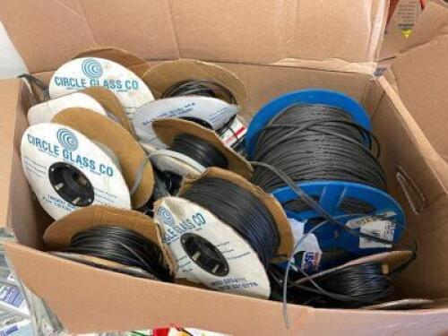 BOX OF ASSORTED SPOOLS OF RUBBER GLASS / WINDOW GASKETS AND SEALS