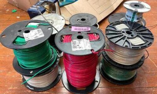 ASSORTED SPOOLS OF ELECTRICAL WIRE AND CABLE.
