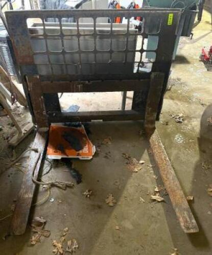 DESCRIPTION: SKID STEER FORK ATTACHMENT LOCATION: SHOP QTY: 1
