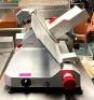 DESCRIPTION: 14" MANUAL SLICER BRAND/MODEL: BERKEL QTY: 1