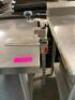 DESCRIPTION: 4' STAINLESS STEEL TABLE WITH UNDERSHELF AND CAN OPENER INFORMATION: WELDED LEGS QTY: 1 - 4