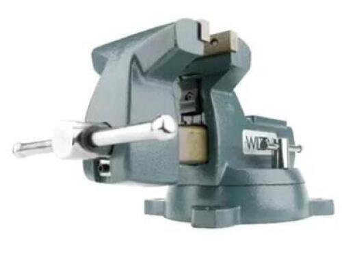 DESCRIPTION: (1) MECHANICS BENCH VISE BRAND/MODEL: WILTON/21400 INFORMATION: WITH SWIVEL BASE/CAST IRON RETAIL$: 384.99 SIZE: 5.25"JAW CAPACITY X 5"JA