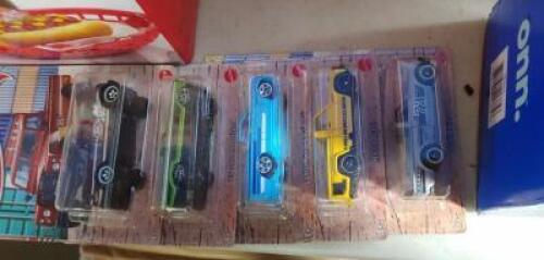DESCRIPTION: (5) TOY TRUCKS BRAND/MODEL: HOT WHEELS RETAIL$: $20.00 EA QTY: 5