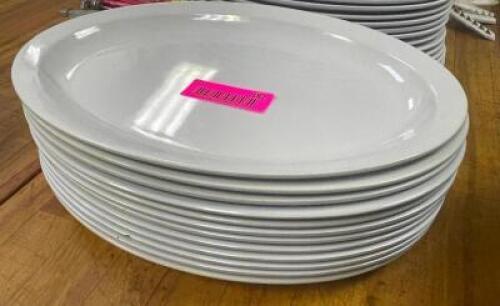 DESCRIPTION: (12) 13" PLASTIC PLATTERS LOCATION: KITCHEN THIS LOT IS: SOLD BY THE PIECE QTY: 12