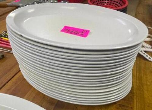 DESCRIPTION: (18) 13" PLASTIC PLATTERS LOCATION: KITCHEN THIS LOT IS: SOLD BY THE PIECE QTY: 18
