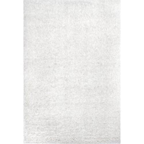 DESCRIPTION: (1) KARA SOLID SHAG AREA RUG BRAND/MODEL: BELLEZA/KKBX01A INFORMATION: IVORY/RECTANGLE RETAIL$: 305.00 SIZE: 8'10" X 12' QTY: 1