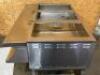 DESCRIPTION: EAGLE THREE WELL GAS STEAM TABLE. BRAND / MODEL: EAGLE ADDITIONAL INFORMATION NATURAL GAS, 150,000 BTU. ON CASTERS. W/ CUTTING BOARD FRON - 5