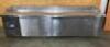 DESCRIPTION: RANDELL FOUR DOOR REFRIGERATED PREP TABLE W/ OPEN TOP COLD WELL. BRAND / MODEL: RANDELL 513114PR ADDITIONAL INFORMATION 120 VOLT, 1 PHASE - 2