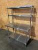 DESCRIPTION: 48" X 24" ALL STAINLESS TABLE W/ TWO TIER RISER SHELF. SIZE: 48" X 24" X 66" LOCATION: 7 QTY: 1 - 2