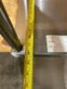 DESCRIPTION: 48" X 24" ALL STAINLESS TABLE W/ TWO TIER RISER SHELF. SIZE: 48" X 24" X 66" LOCATION: 7 QTY: 1 - 7
