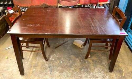DESCRIPTION: WOODEN DINING TABLE WITH (2) CHAIRS INFORMATION: SURFACE IS SCRATCHED SIZE: 35.5"X58.5" QTY: 1