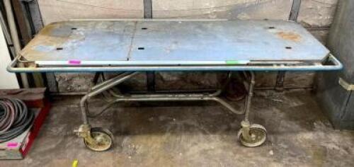 DESCRIPTION: MEDICAL GURNEY QTY: 1